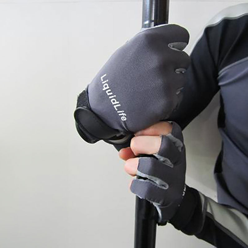 An image of a man wearing the half finger paddle gloved from LiquidLife