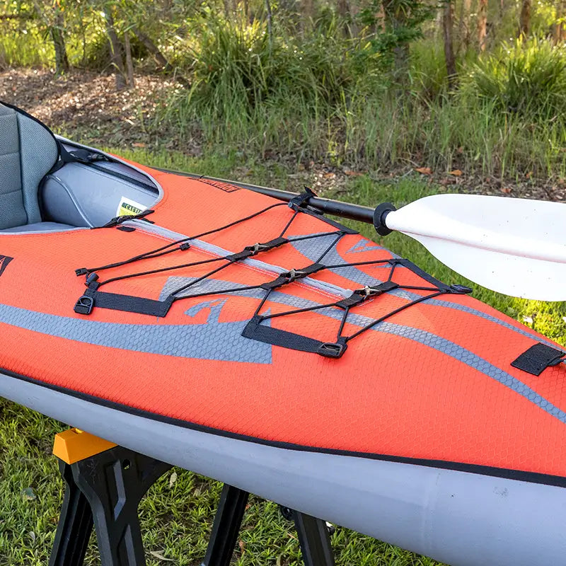 A photo of the front bungee cord for storage on the Convertible Elite Inflatable kayak from Advanced Elements