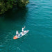 An over head shot of 2 people paddling the Cascade 2 Person Hybrid Kayak SUP