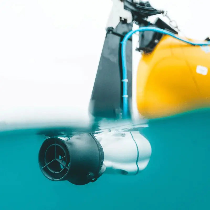 An underwater shot of the bixpy J2 mounted to a kayak rudder