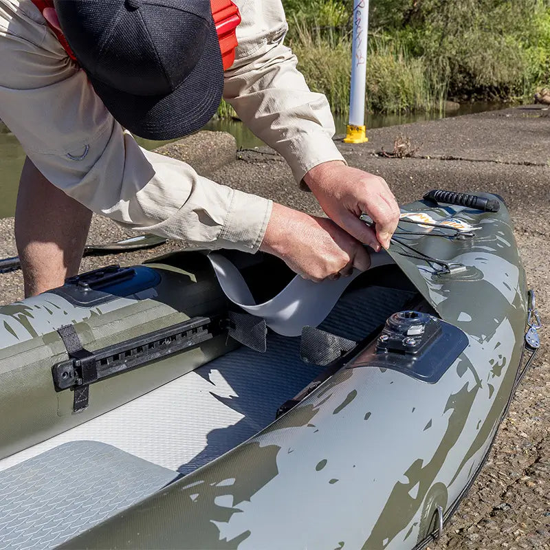 An image installing the deck risers on the Quest Angler Inflatable Kayak 