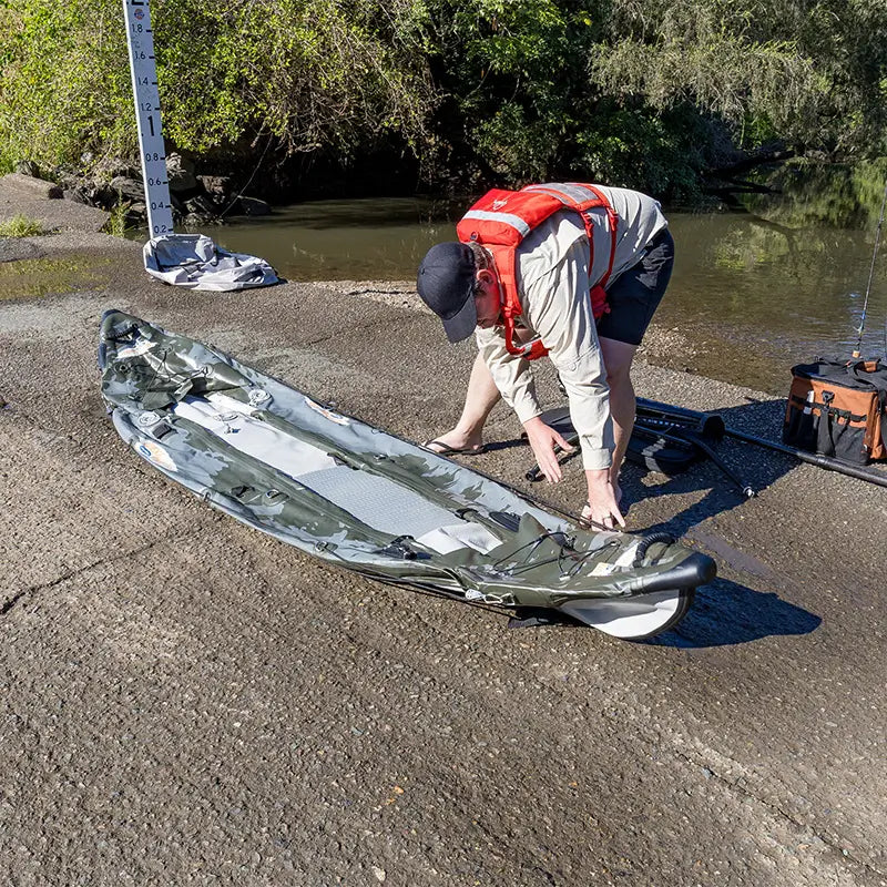A photo of the Quest Angler Kayak deflated and unrolled 