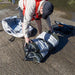 A photo of the Quest Angler Inflatable Fishing Kayak rolled up ready for setup 