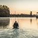 kayak fisher heading out on a calm morning