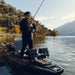 An image of a man fishing with lures while standing in the Titan X Propel 10.5