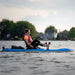 Image of a lady paddling the pelican getaway 110 on open water