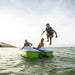 a young boy jumping off the Pelican Monaco DLX Pedal Boat